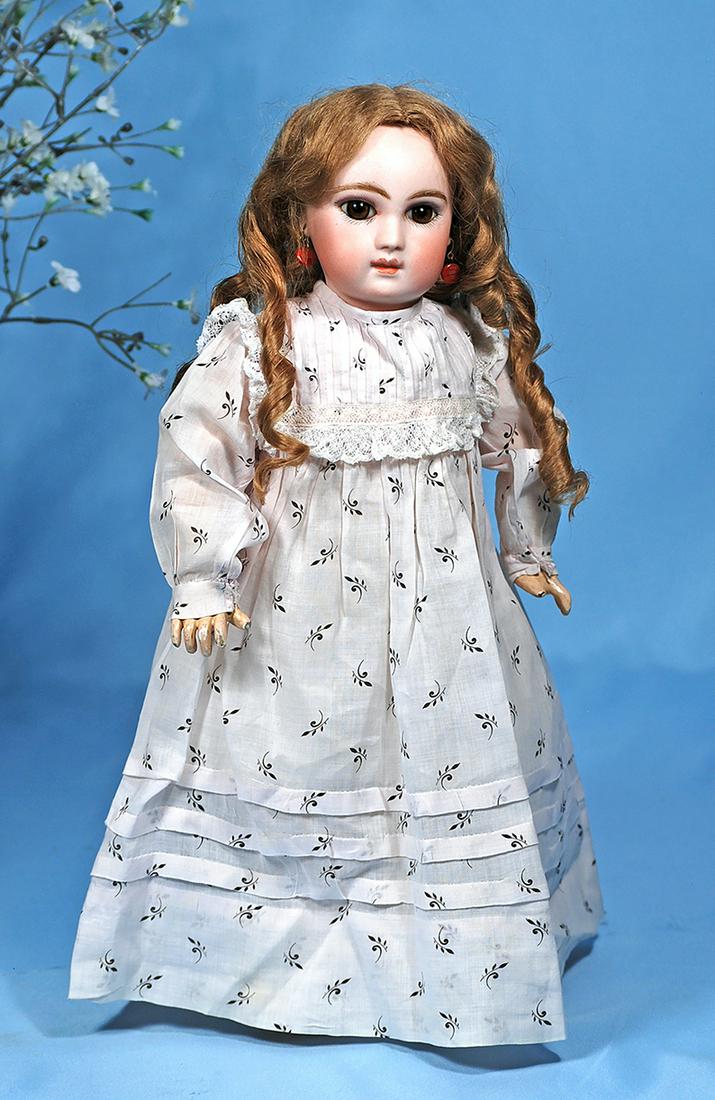GORGEOUS EARLY FRENCH BISQUE PORTRAIT BEBE BY EMILE: GORGEOUS EARLY FRENCH BISQUE PORTRAIT BEBE BY EMILE JUMEAU. 14 ½". Bisque socket head, almond-shaped amber brown paperweight eyes, eyeliner, painted lashes, rose-blushed eyelids, pierced ears, closed