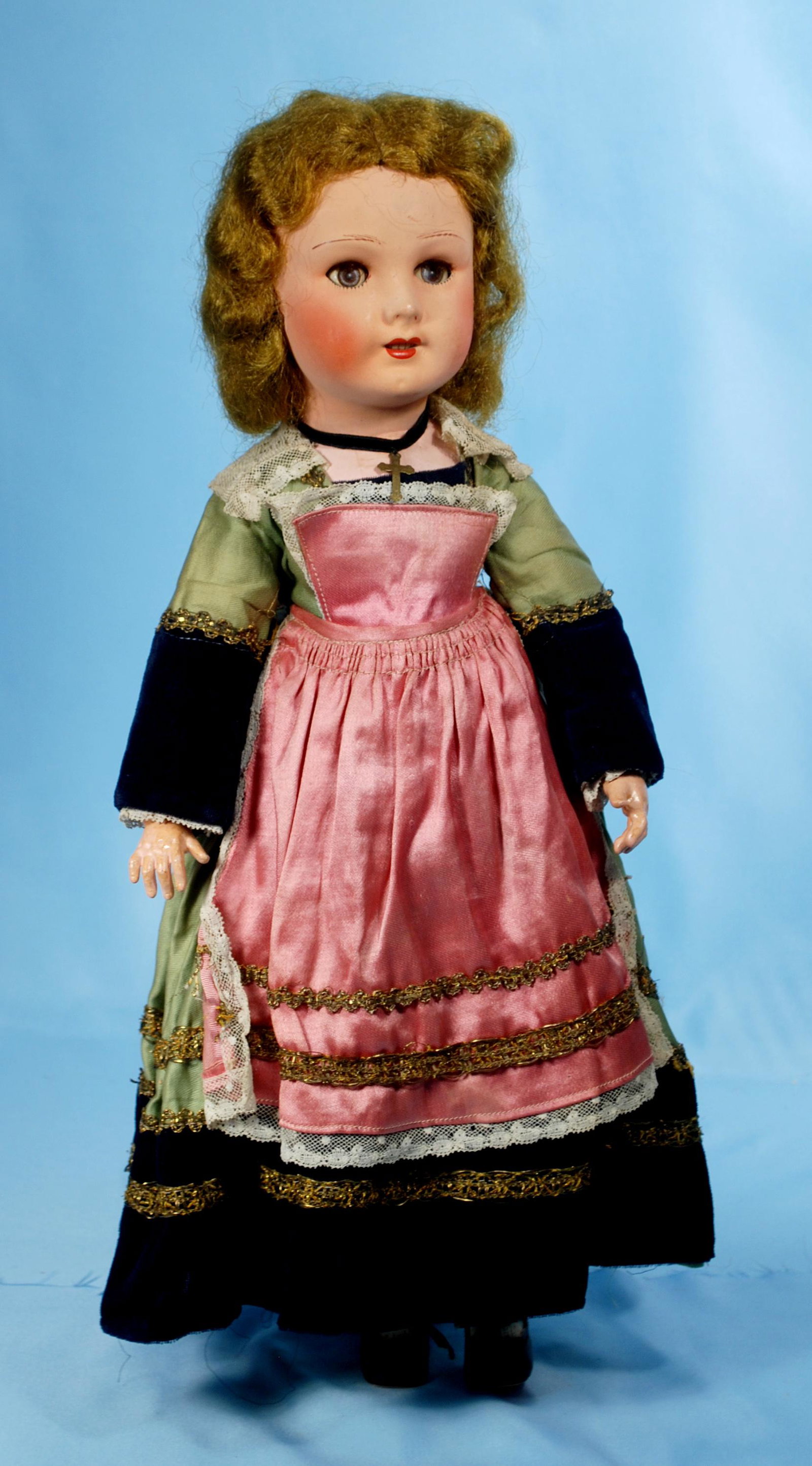 FRENCH PAPIER MACHE CHILD IN PROVINCIAL COSTUME BY: FRENCH PAPIER MACHE CHILD IN PROVINCIAL COSTUME BY SFBJ. Marks: SFBJ. 19". Papier mache socket head with brown glass sleep eyes, painted and applied lashes, open mouth, original wig, French wooden and