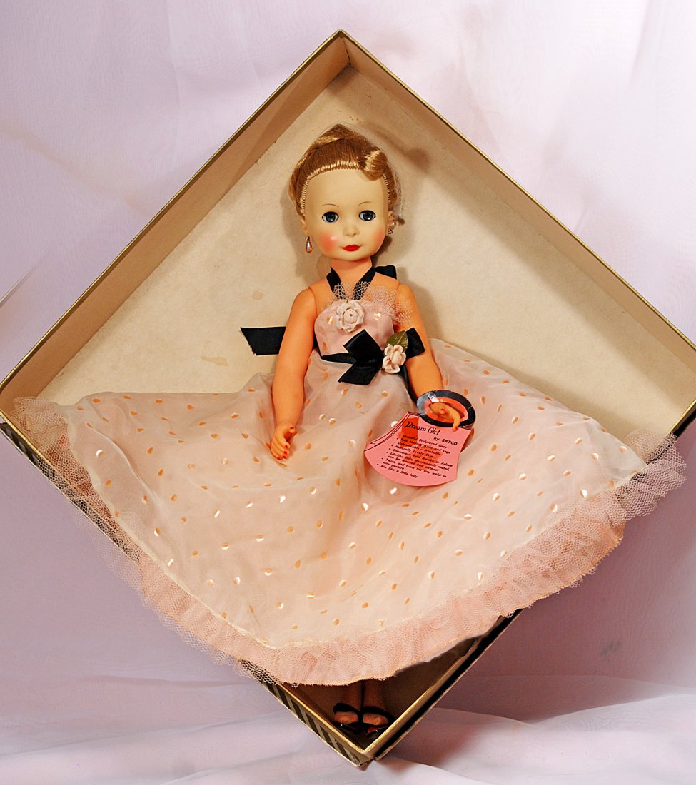 AMERICAN FASHION DOLL "DREAM GIRL" BY SAYCO: 46. AMERICAN FASHION DOLL “DREAM GIRL” BY SAYCO. – ORIGINAL BOX. 18”. Vinyl socket head on jointed vinyl adult body, sleep eyes, rooted blond saran hair, original tulle and taffeta formal, hos
