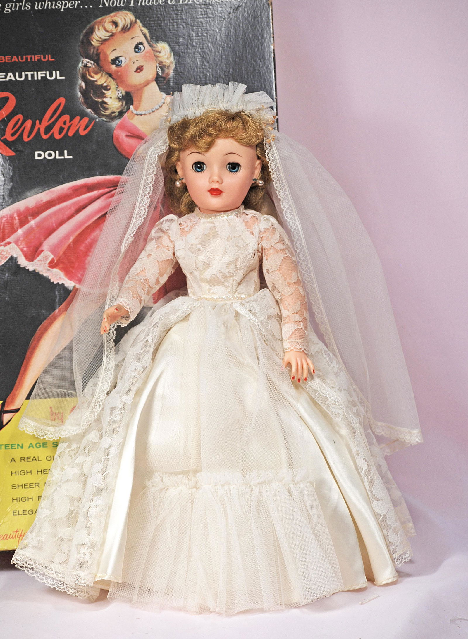IDEAL MISS REVLON AS "SNOW PEACH BRIDE" IN ORIGINAL BOX: IDEAL MISS REVLON AS "SNOW PEACH BRIDE" IN ORIGINAL BOX. 18". Vinyl socket head, lady body with swivel waist, jointing at shoulders and hips, blue sleep eyes, red lips, blonde saran rooted hair with b