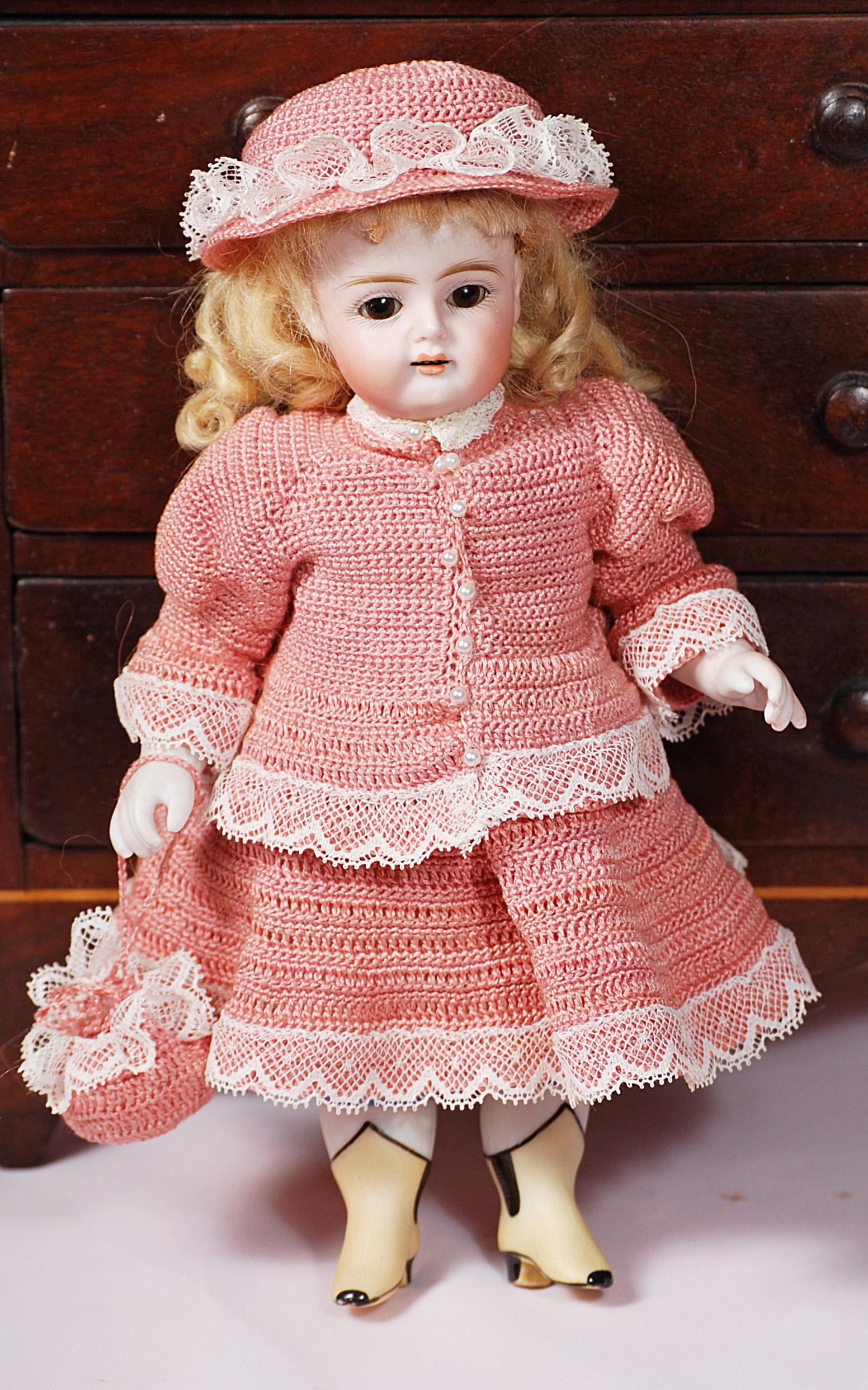 LARGE KESTNER ALL-BISQUE DOLL WITH YELLOW BOOTS. (1 of 1)