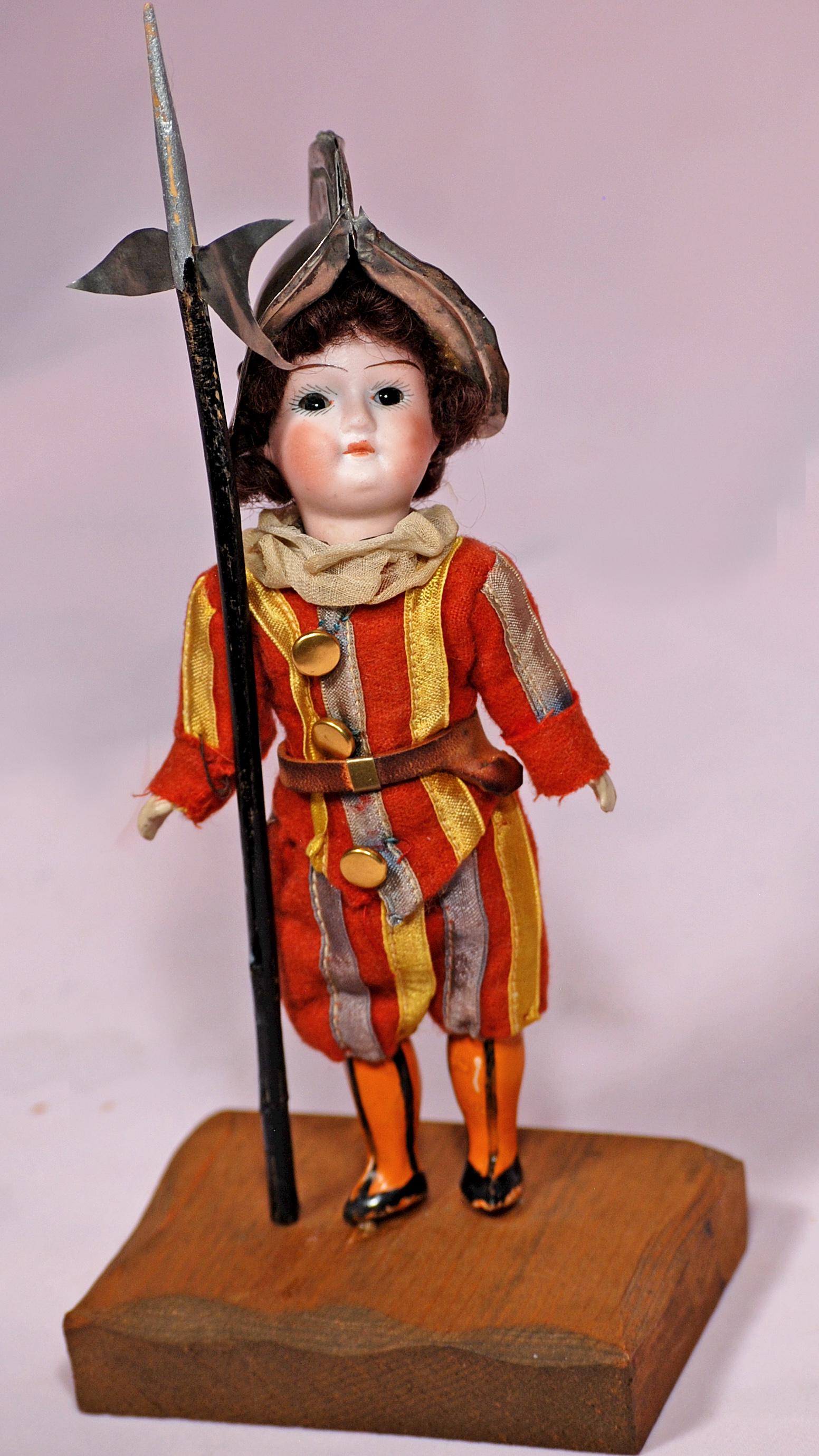 PETITE GERMAN BISQUE DOLL AS SWISS GUARD (1 of 1)