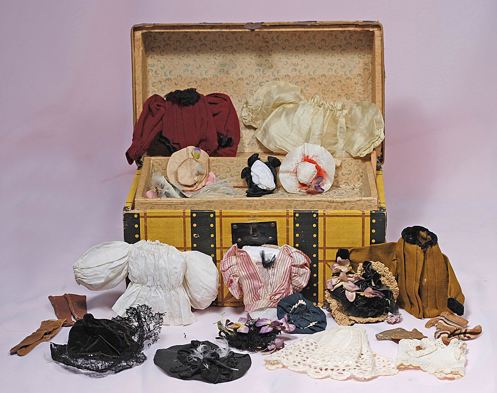 SMALL ANTIQUE DOLL TRUNK WITH CLOTHING AND ACCESSORIES (1 of 1)