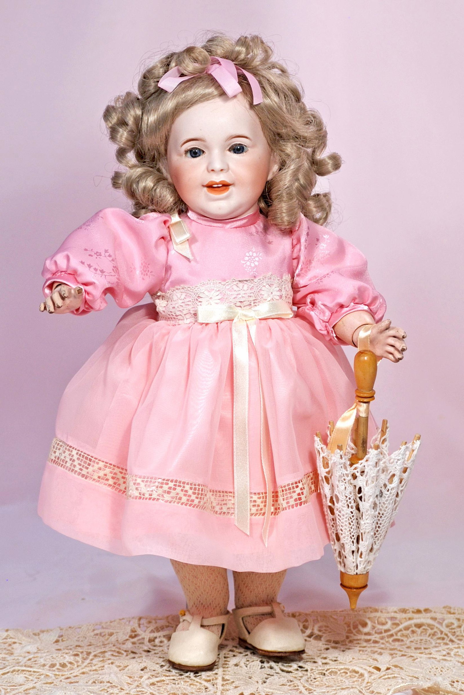 FRENCH BISQUE "LAUGHING JUMEAU" TODDLER BY S.F.B.J.: FRENCH BISQUE "LAUGHING JUMEAU" TODDLER BY S.F.B.J. 15". Bisque socket head, blue sleep eyes, applied upper lashes, painted lower lashes, feathered brows, open/closed mouth with modeled tongue and upp