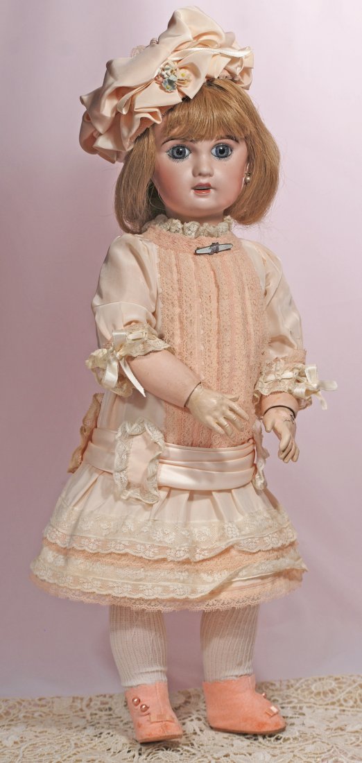 FRENCH BISQUE JUMEAU-TYPE BEBE BY LANTERNEIR: 103. FRENCH BISQUE JUMEAU-TYPE BEBE BY LANTERNEIR. Marks: Fabrication Francaise, AL & C. Limoges Cherie 8. 20”. Bisque socket head, blue paperweight eyes, painted lashes, eyeliner, feathered brows, 