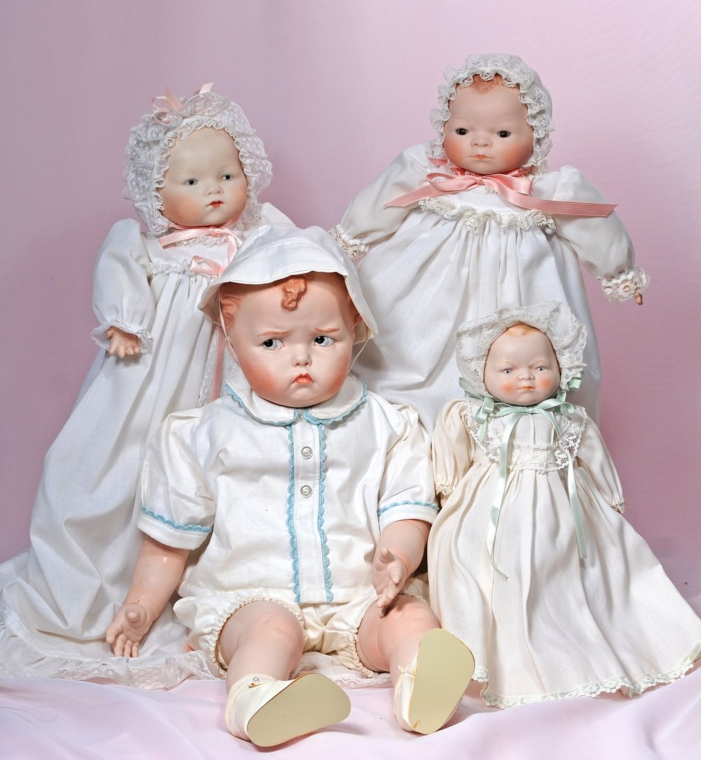 LOT OF FOUR BISQUE REPRODUCTION DOLLS. (1 of 1)