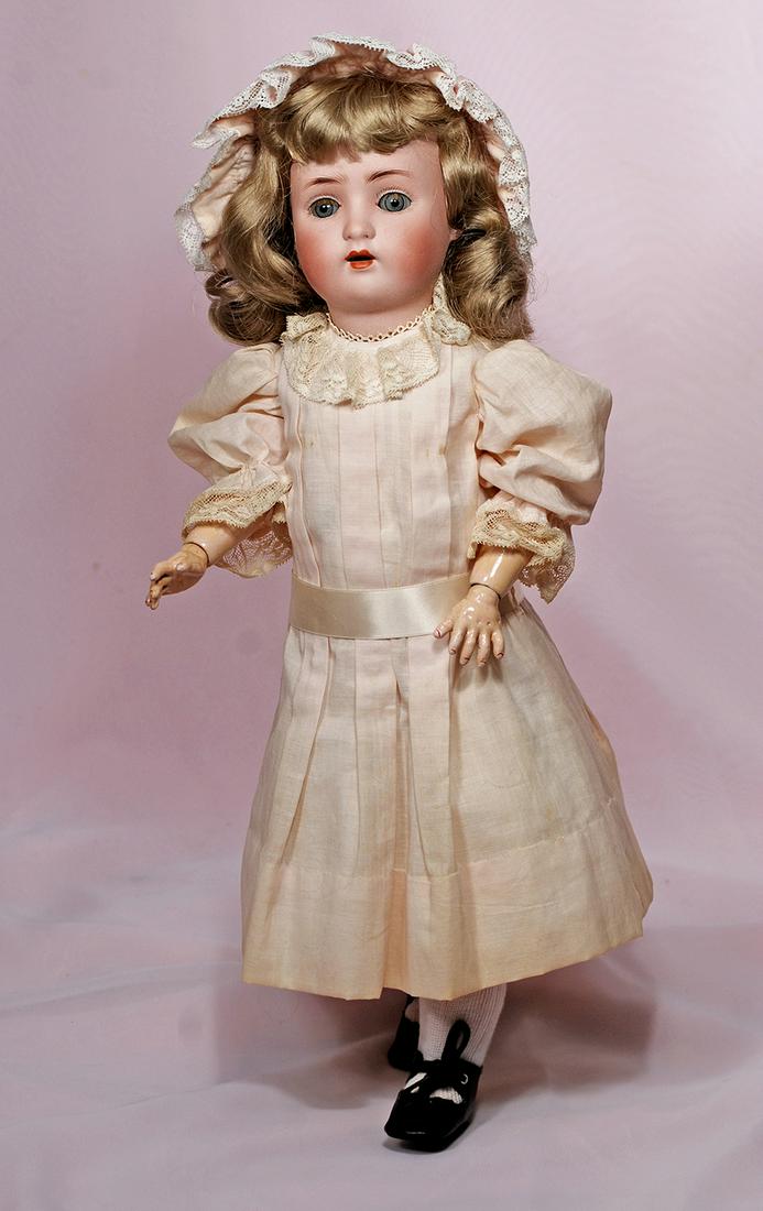 GERMAN BISQUE CHILD WITH WALKER BODY BY ALT, BECK &: GERMAN BISQUE CHILD WITH WALKER BODY BY ALT, BECK & GOTTSCHALCK. 19”. Marks: ABG 1362 made in Germany 1. Bisque socket head, blue sleep eye, painted lower lashes, original applied upper lashes, feat