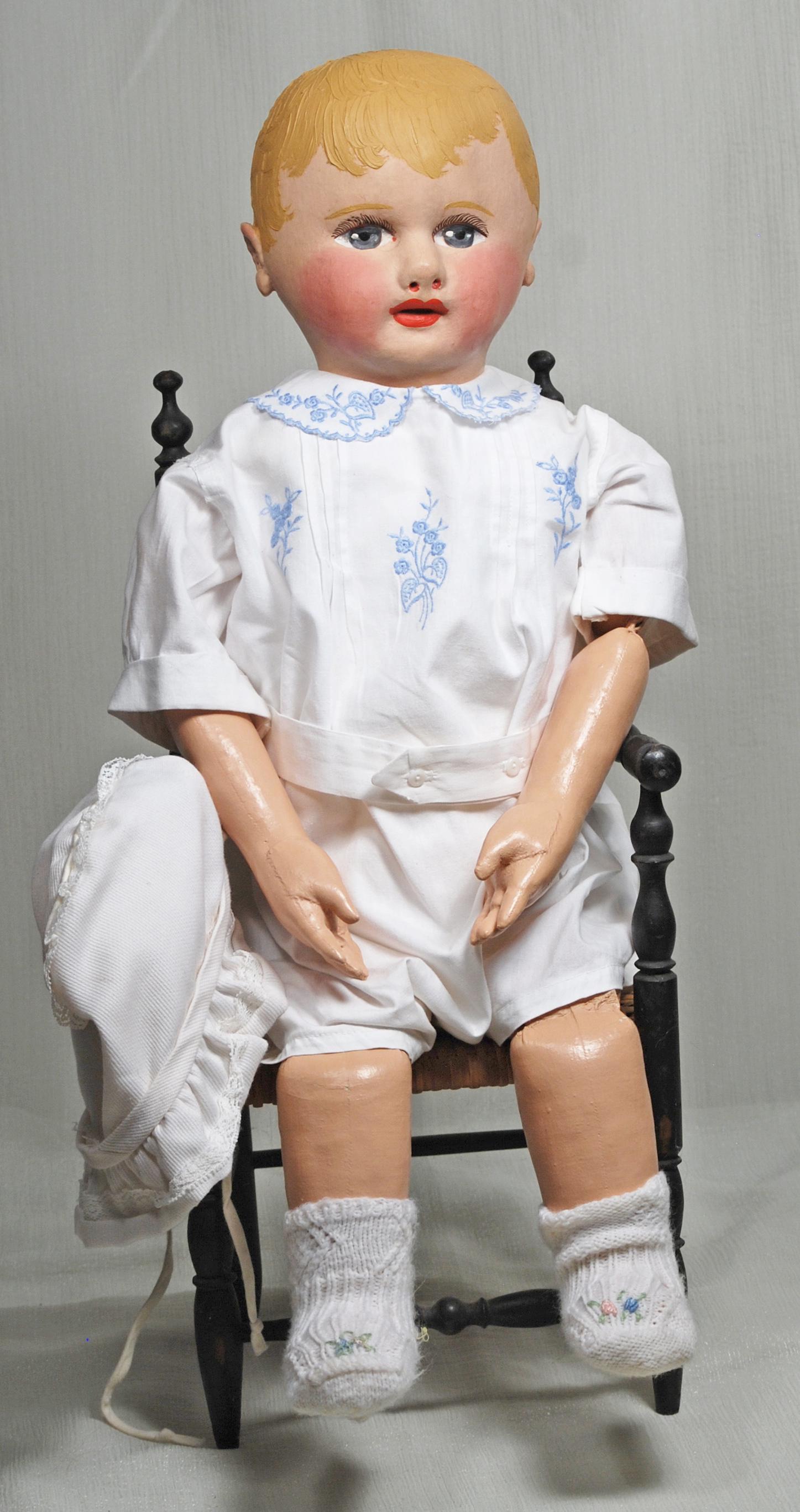 AMERICAN CLOTH HOSPITAL BABY BY MARTHA CHASE: AMERICAN CLOTH HOSPITAL BABY BY MARTHA CHASE. 23". All cloth with pressed and oil-painted complexion, blonde impasto-modelled hair, painted features, blue eyes, long curly eyelashes, closed mouth, oil