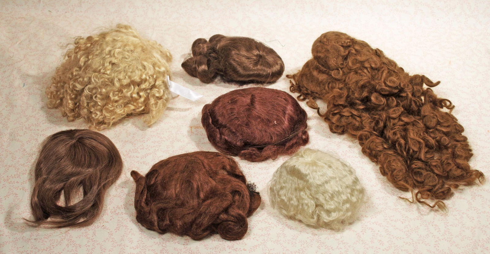 SEVEN DOLL WIGS (1 of 1)