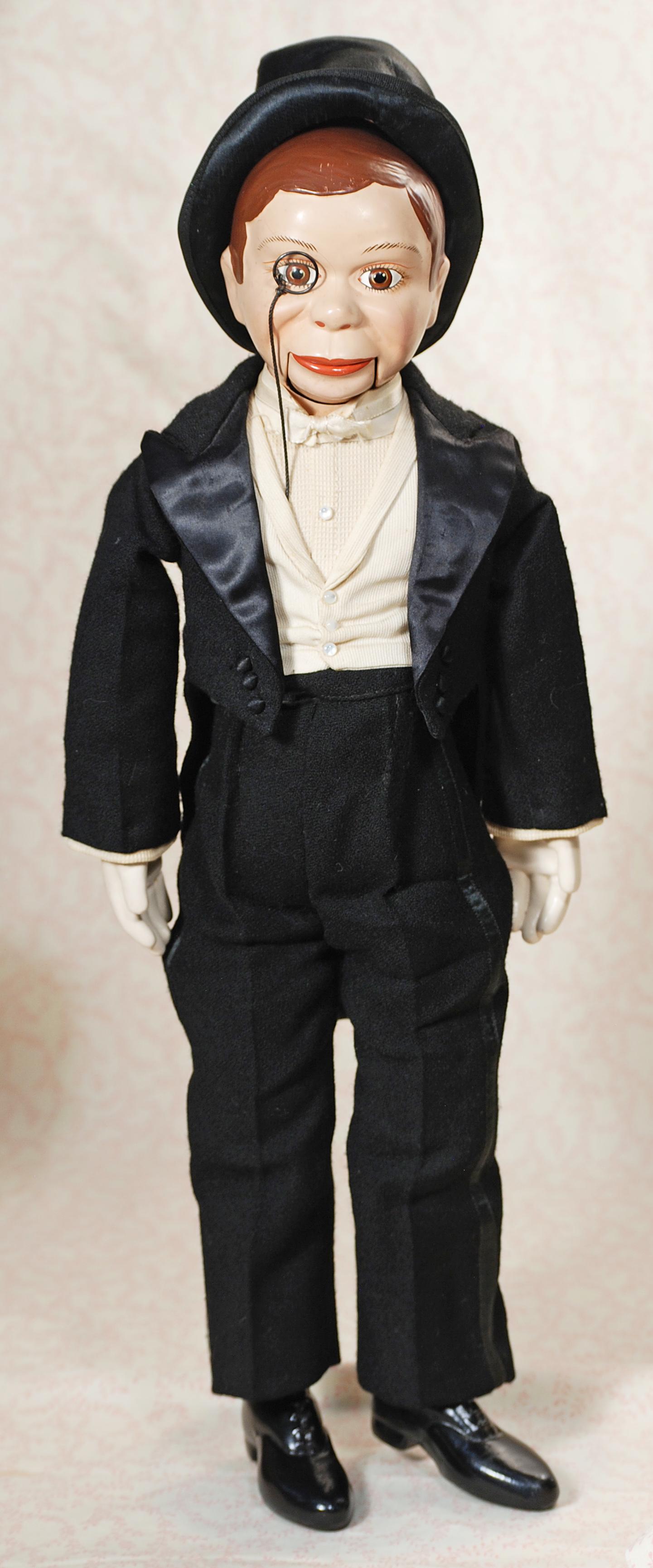 COMPOSITON CHARLIE MCCARTHY BY EFFANBEE: COMPOSITON CHARLIE MCCARTHY BY EFFANBEE. 17". Marks: Edgar Bergen’s Charlie McCarthy An Effanbee Product. Composition shoulderhead with painted brown side-parted hair, painted brown eyes, painted la