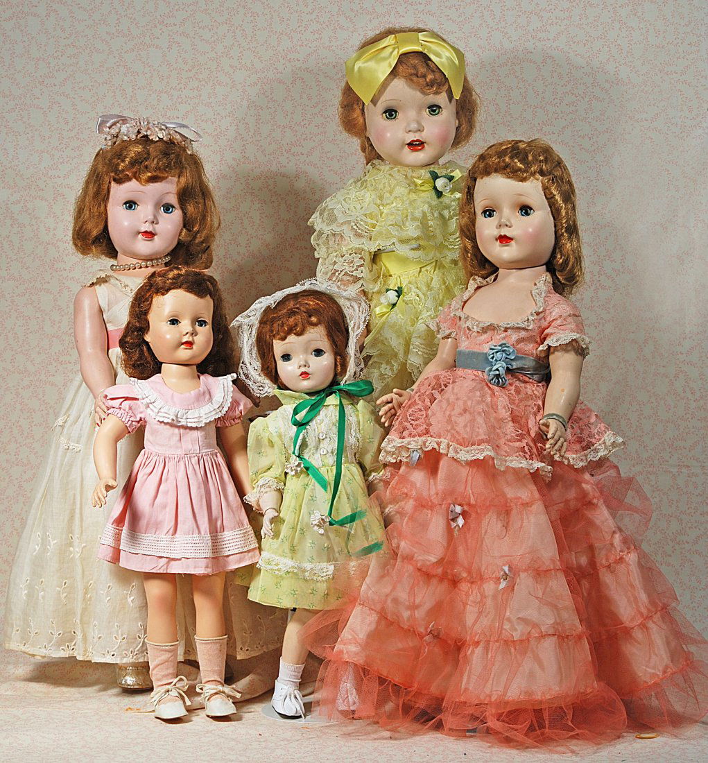 FIVE HARD PLASTIC DOLLS. (1 of 1)
