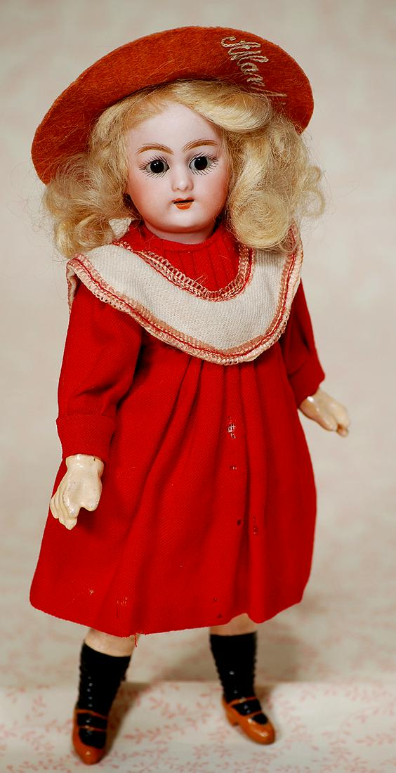 PETITE GERMAN BISQUE CHILD BY SIMON AND HALBIG: PETITE GERMAN BISQUE CHILD BY SIMON AND HALBIG. 8 ½”. Marks Dep, Germany, S & H. Bisque socket head, brown sleep eyes, painted lashes, feathered brows, open mouth, upper teeth, original blo