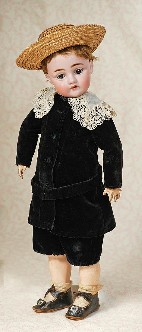 GERMAN BISQUE CHARACTER BY KESTNER: GERMAN BISQUE CHARACTER BY KESTNER. 16”. Marks: D made in Germany 8. Bisque socket head, brown sleep eyes, painted lashes, feathered brows, open mouth, shaded and accented lips, two upper teeth,