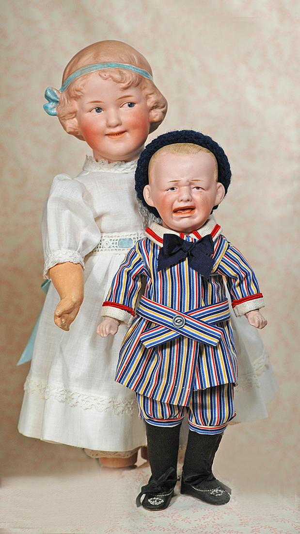 GERMAN BISQUE "COQUETTE" BY GEBRUDER: GERMAN BISQUE "COQUETTE" BY GEBRUDER HEUBACH. 15". Heubach in square/Germany, 7788. Bisque socket head, sculpted short curly hair with glazed aqua painted hair band and bow, intaglio side-glancing blu