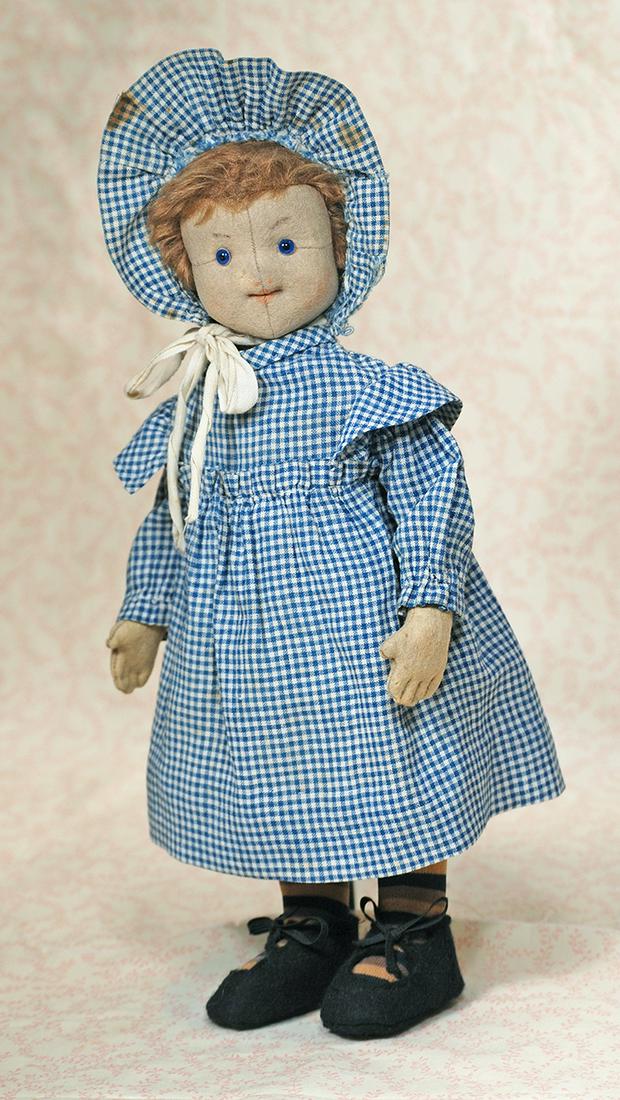 GERMAN FELT CHARACTER DOLL BY STEIFF: GERMAN FELT CHARACTER DOLL BY STEIFF. 13". Felt swivel head with center face seam and eye corner seams, blue glass eyes, painted brows and stitch-shaped mouth, mohair inserted wig, jointing at shoulde