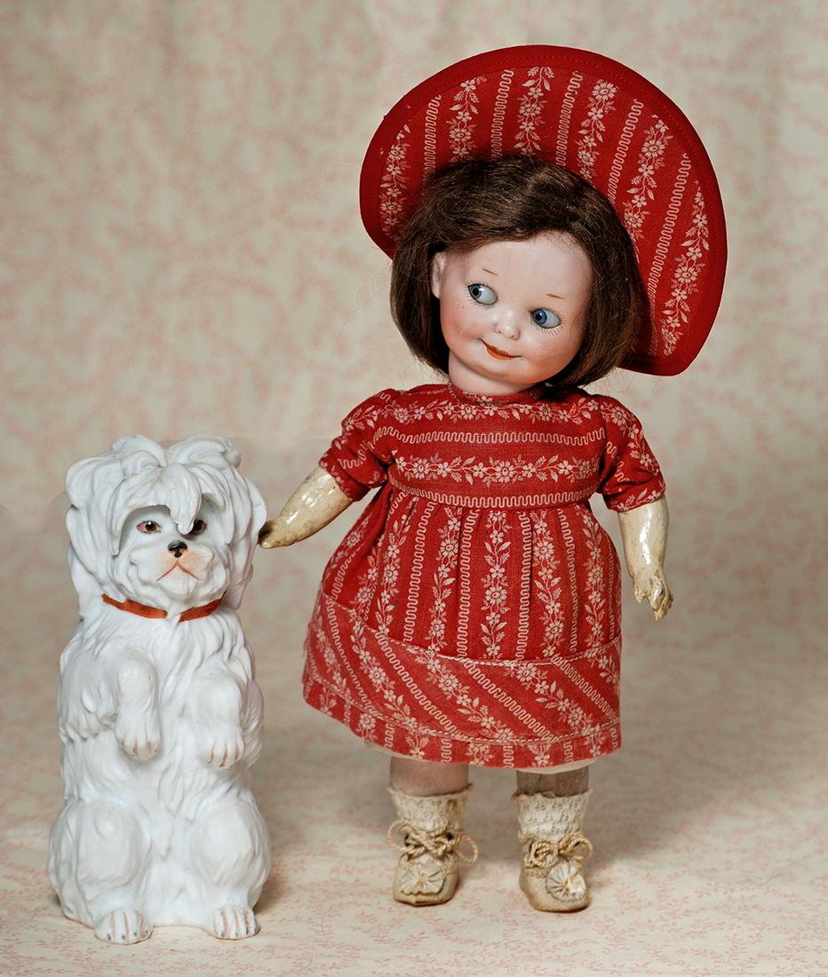 GERMAN BISQUE GOOGLY, 253, BY MARSEILLE: GERMAN BISQUE GOOGLY, 253, BY MARSEILLE. 9”. Marks: G.B. 253 Germany A. 6 M. Bisque socket head, stationary side-glancing blue eyes, painted lashes, short dash-type brows, smiling closed mouth, 