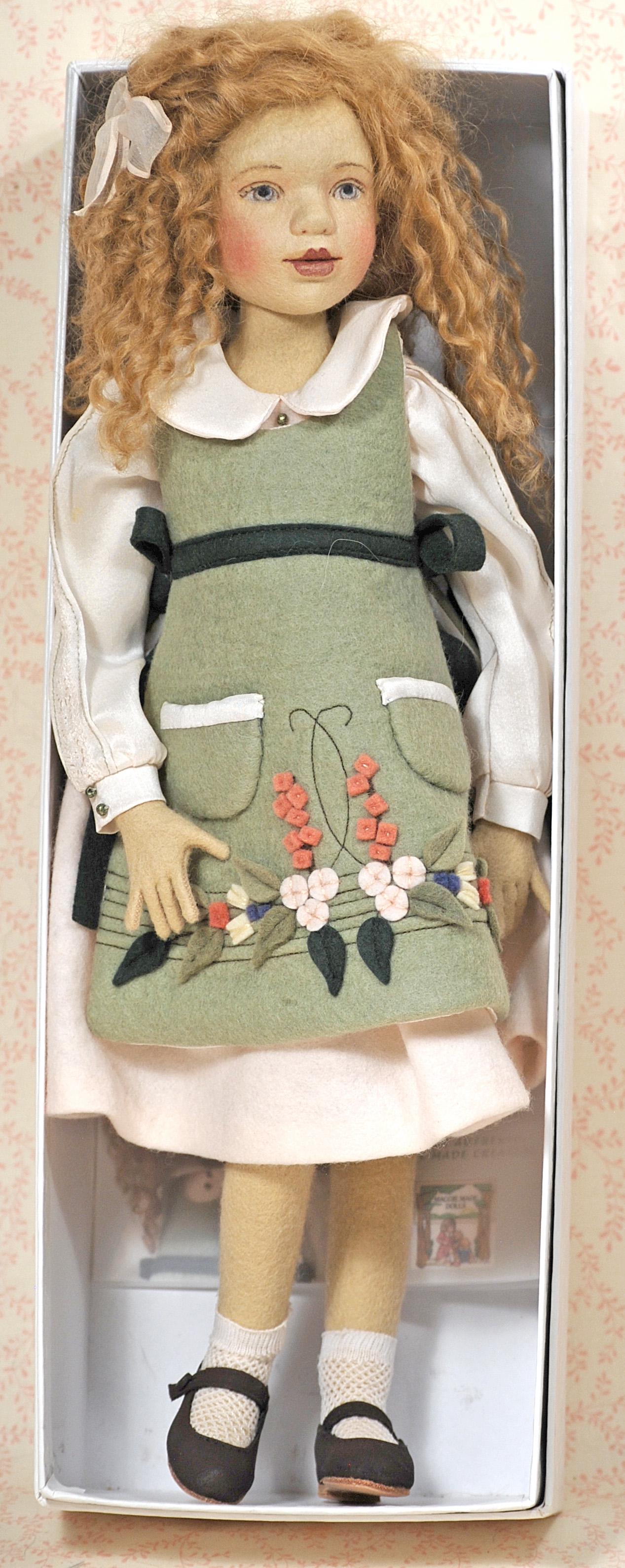 MAGGIE IOCONO DOLL “AMY”: MAGGIE IOCONO DOLL “AMY”. 15”. All felt doll depicting young lady with slender shape, swivel head painted green eyes, very full lips, curly mohair wig, ball-jointing at shoulders, el