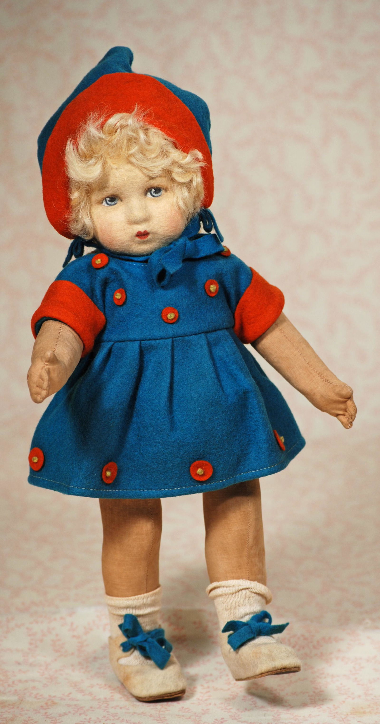 ITALIAN FELT LENCI-LOOK-ALIKE DOLL: ITALIAN FELT LENCI-LOOK-ALIKE DOLL. 12". Pressed felt swivel head, painted blue eyes, curly lashes, closed mouth, blonde mohair wig, five-piece jointed cloth toddler body, teal blue and dark coral fel