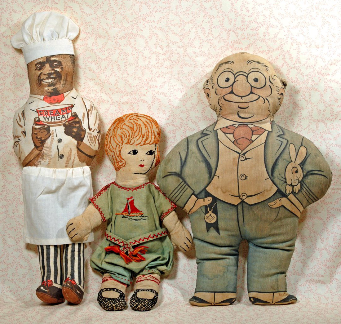 THREE AMERICAN CLOTH DOLLS: 269. THREE AMERICAN CLOTH DOLLS. Two lithographed muslin figures with printed facial features and costume, includes 18" Rastus Chef, Cream of Wheat advertising doll, and 17Â” Foxy Grandpa by Art Fa