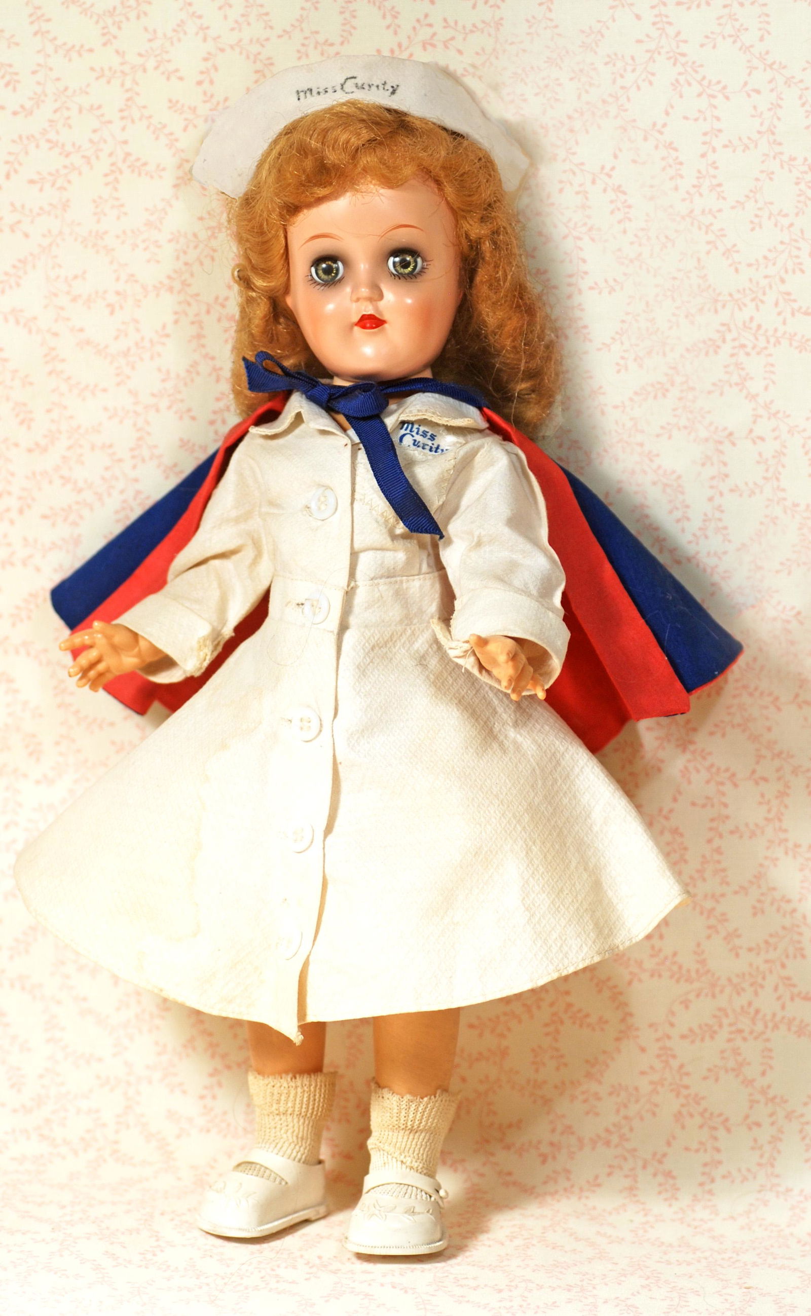 IDEAL “MISS CURITY NURSE.: IDEAL “MISS CURITY NURSE. Marks: P-90 Ideal Doll. 14". Hard plastic socket head, five-piece jointed body, sleep eyes, applied upper lashes, painted lower lashes, gray eye shadow, ruby lips, blonde S