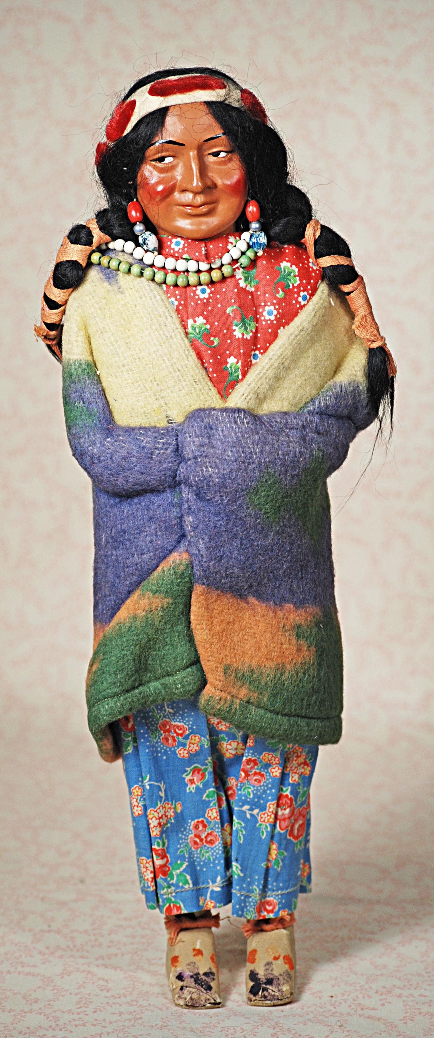 ALL-ORIGINAL "SKOOKUMS" NATIVE AMERICAN DOLLS BY MARY: ALL-ORIGINAL "SKOOKUMS" NATIVE AMERICAN DOLLS BY MARY MC ABOY. 16". Portrait doll with paper mache sculpted face and highly characterized modelling, painted features, side-glancing eyes, closed mouth 