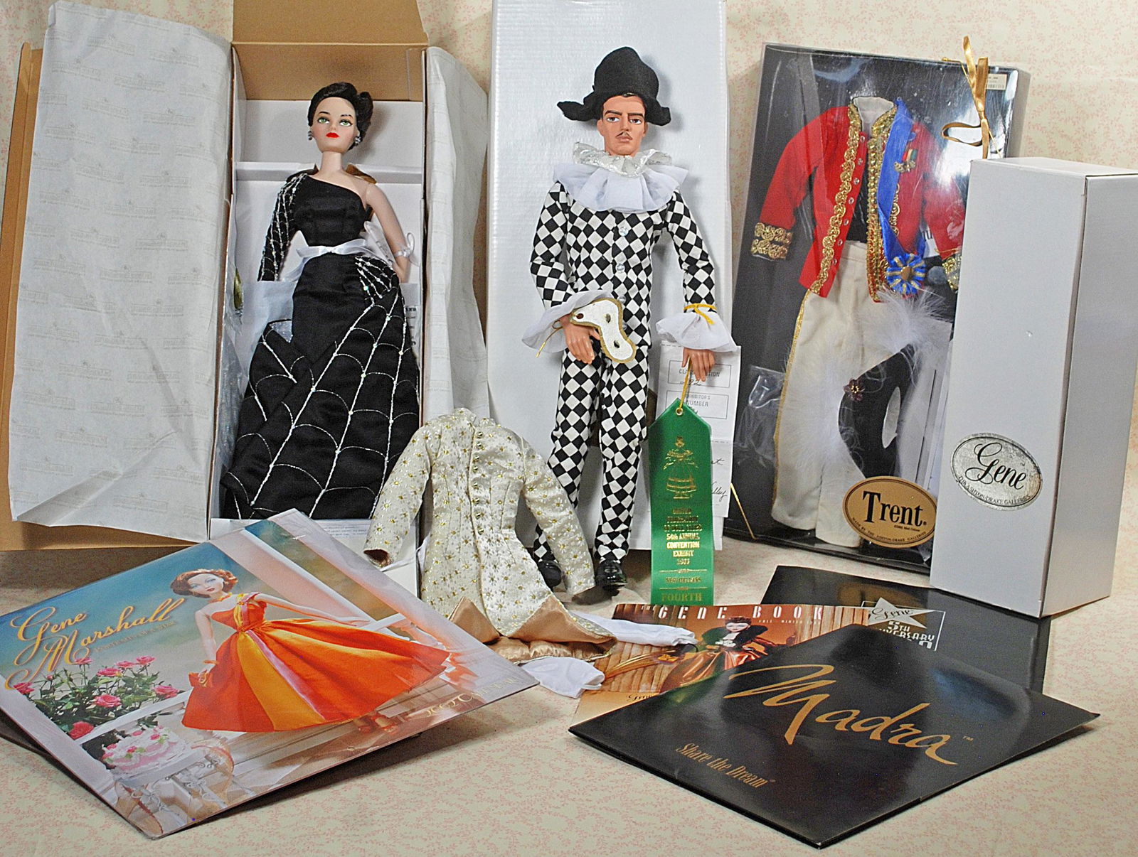 ASTON DRAKE GENE MADRA "BLACK WIDOW", TRENT DOLL AND: ASTON DRAKE GENE MADRA "BLACK WIDOW", TRENT DOLL AND COSTUME, DRESS FORM, GENE MARSHALL 2002 CALENDAR. Gene as the Black Widow; Trent "The Rains Came" with disguise costume; costume; Royal Military bo