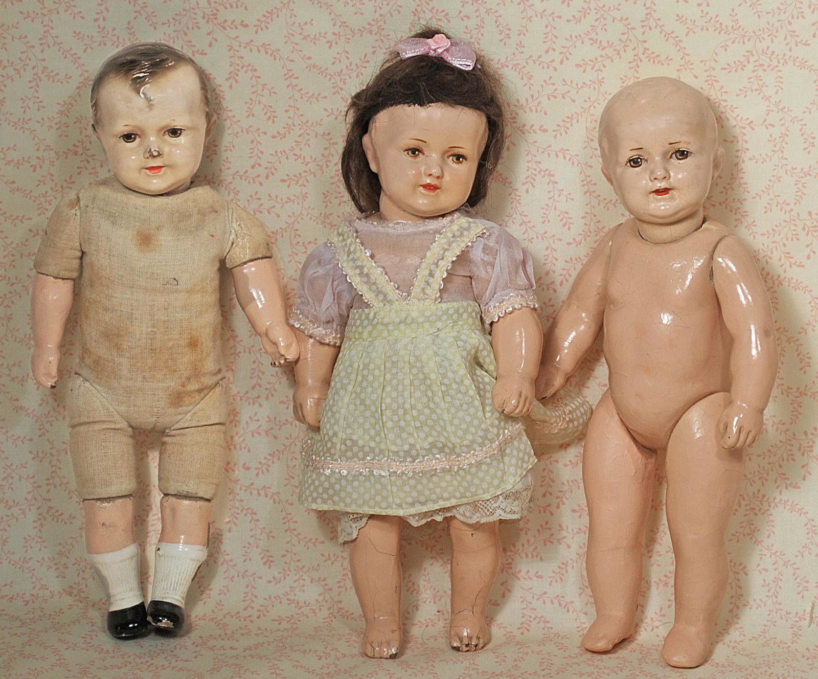 THREE JESSIE MC CUTHEON RALEIGH COMPOSITION DOLLS.: THREE JESSIE MC CUTHEON RALEIGH COMPOSITION DOLLS. 11". Each is composition toddler with painted features; two with composition jointed toddler body and one with cloth body and composition lower limbs