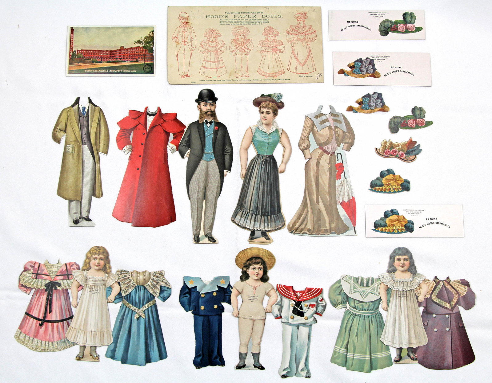 TWO SETS OF HOOD'S FAMILY ADVERTISING PAPER DOLLS, 1894: TWO SETS OF HOOD'S FAMILY ADVERTISING PAPER DOLLS, 1894. One set has 5 paper dolls ranging from 7" to 9" each with one or two outfits, and envelope. Back of the clothes and dolls have advertisements f
