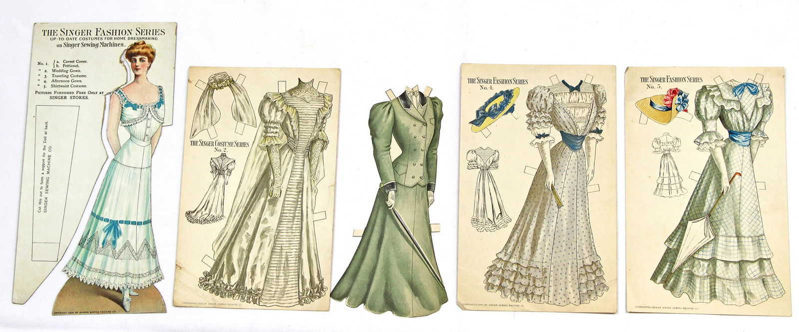 TWO SETS OF AMERICAN ADVERTISING PAPER DOLLS, 1895.: TWO SETS OF AMERICAN ADVERTISING PAPER DOLLS, 1895. One 8" cut and one 8" partially cut single sided lady shown in corset and petticoat with advertising for Singer Sewing Machines on the back; Each wi