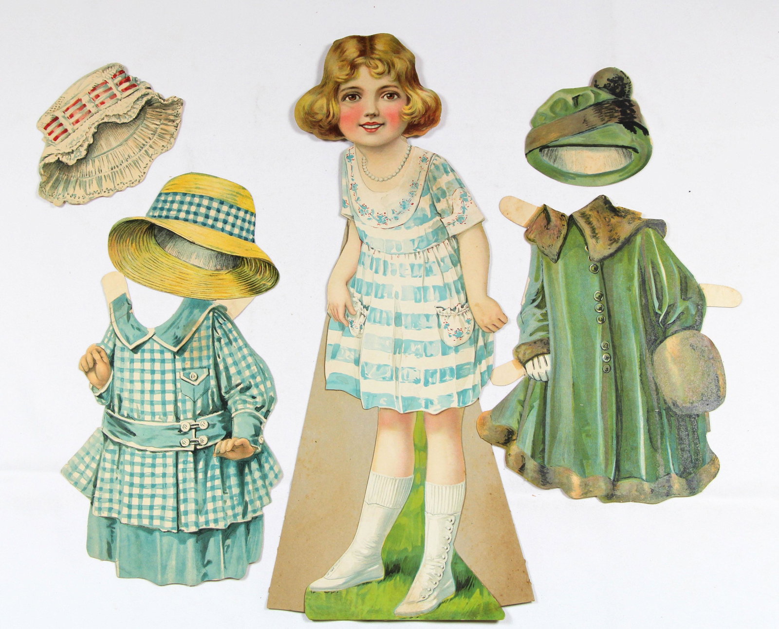 SIX DRESSING DOLLS SETS FROM WOOLWORTH 1916-1917 SERIES: SIX DRESSING DOLLS SETS FROM WOOLWORTH 1916-1917 SERIES. 21" Single-sided cardboard dolls. 1917 series include: Blanche (set A), Edith (set B), Florence (set C), Lucy (set D) each with 3 dresses and h