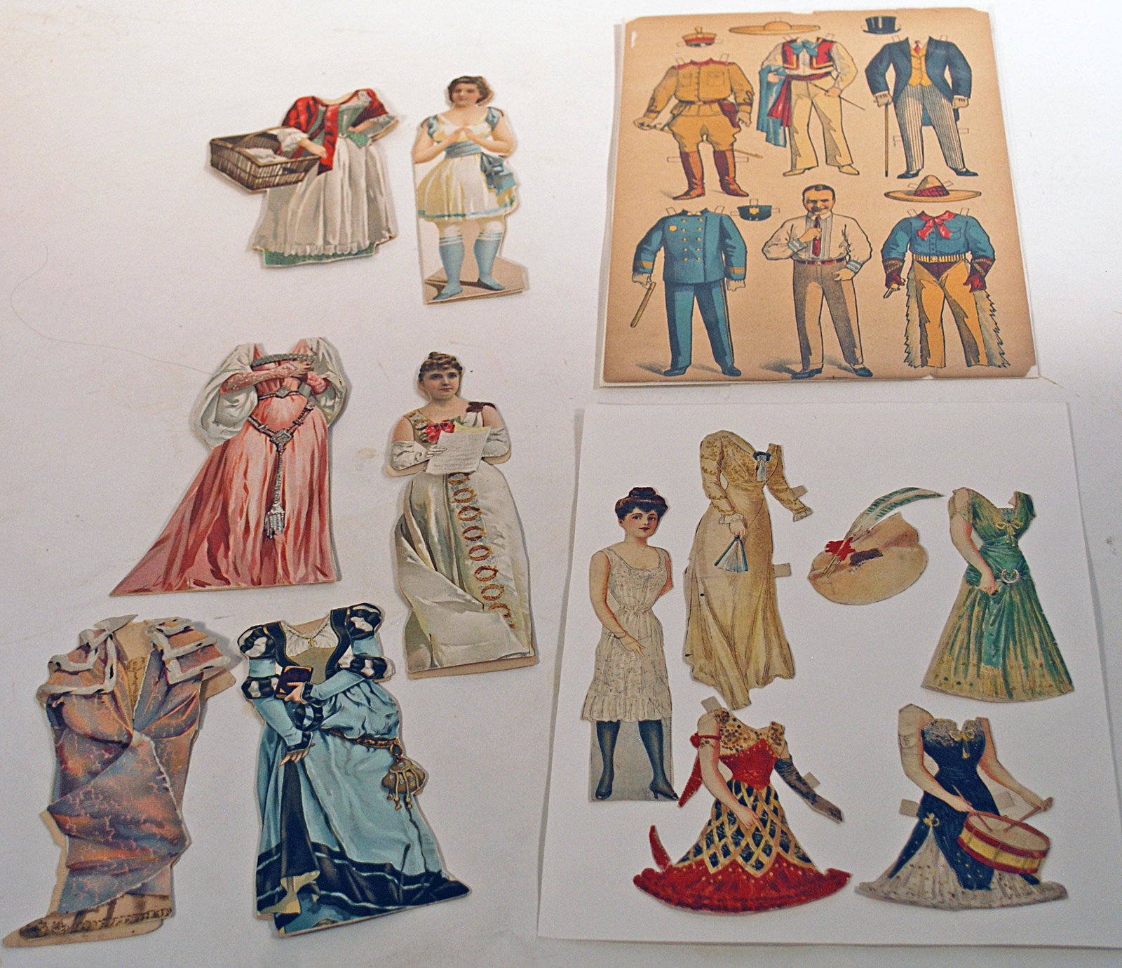 STARS OF SCREEN & STAGE PAPER DOLLS: STARS OF SCREEN & STAGE PAPER DOLLS. Includes: 8 1/2" x 11" uncut sheet of Douglas Fairbanks paper doll; Vienna born actress and opera star Fritzi Scheff with three gowns and one bonnet, (missing one 