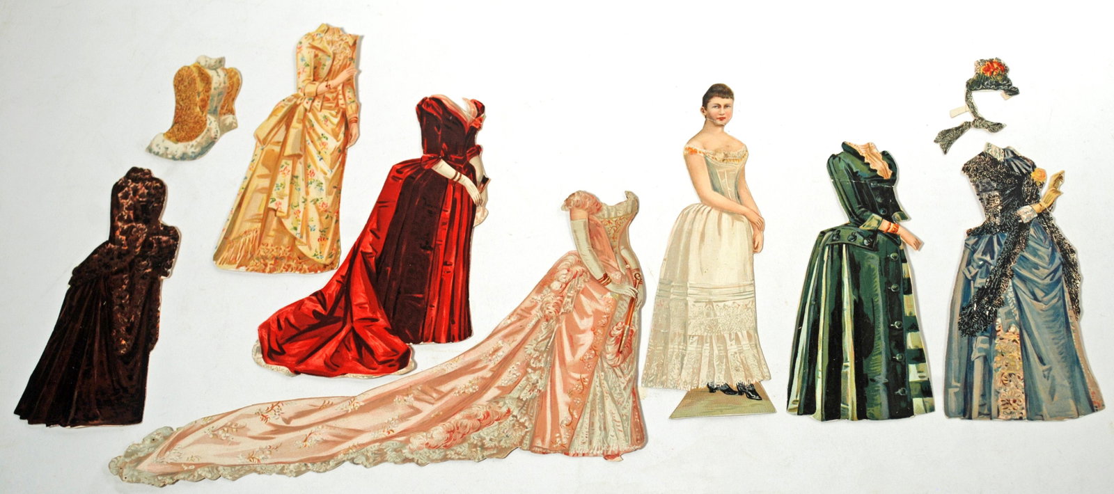 GERMAN ROYALTY BY WS&B, c. 1888: GERMAN ROYALTY BY WS&B, c. 1888. Five royal figures mostly 6 1/2" engraved and embossed, already cut, one sided paper dolls with beautiful costumes and accessories. And one baby with a gown. Rare prin