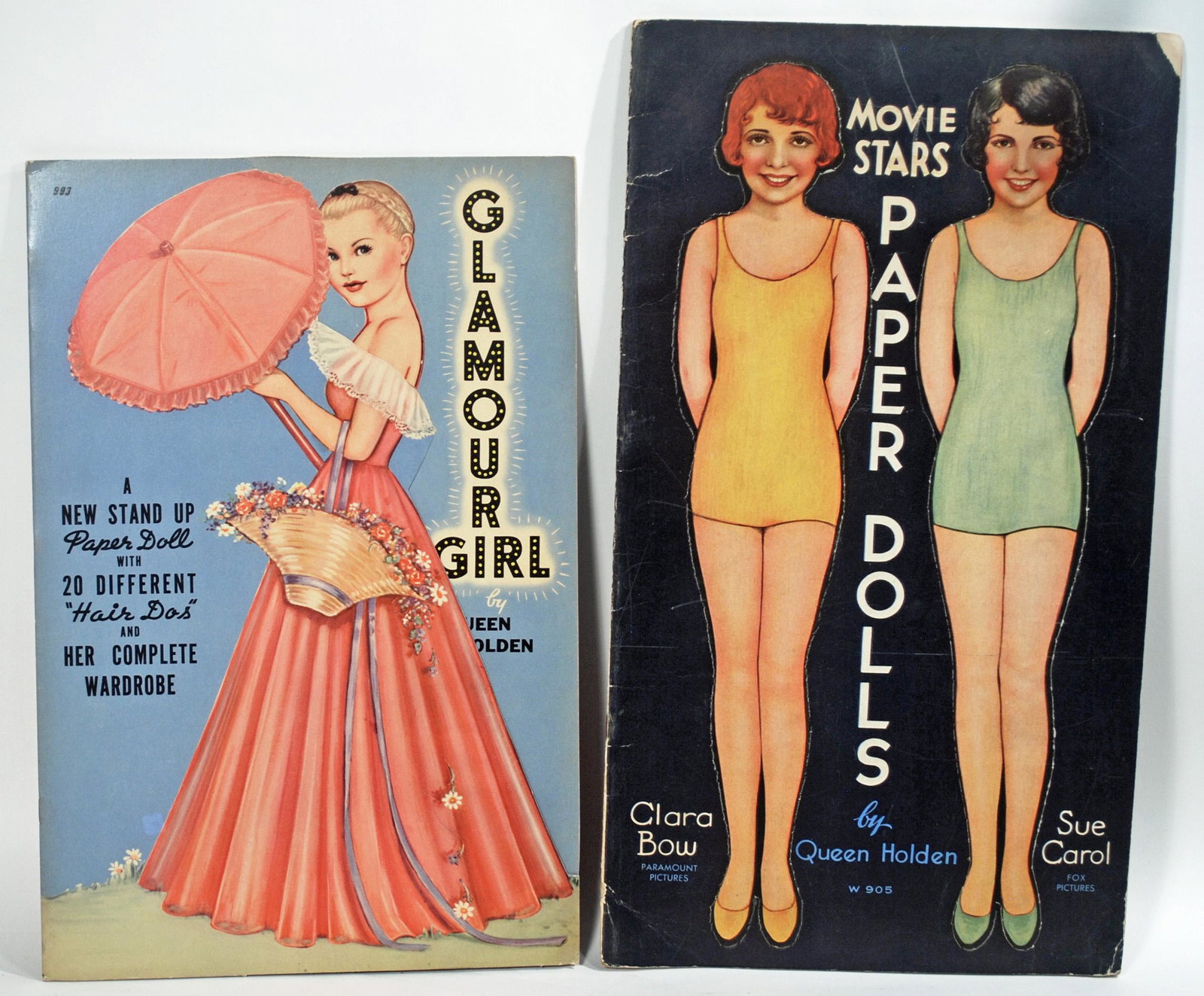 QUEEN HOLDEN "GLAMOUR GIRLS" & "MOVIE STAR PAPER DOLLS: QUEEN HOLDEN "GLAMOUR GIRLS" & "MOVIE STAR PAPER DOLLS CLARA BOW & SUE CAROL" BOOKS. Each is uncut book of paper dolls, costumes and accessories. Commentary: Circa 1928-1931, excellent condition. Esti
