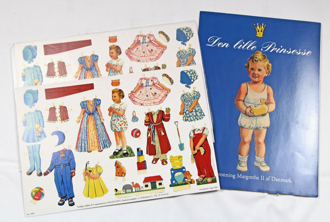 PRINSESSE MARGRETHE II OF DANMARK PAPER DOLLS: PRINSESSE MARGRETHE II OF DANMARK PAPER DOLLS. Two 17" x 12" uncut sheets (same copy) with little princess and her costumes, toys, accessories; And, one 12" x 16 1/2" folder with 6 uncut sheets. Comme