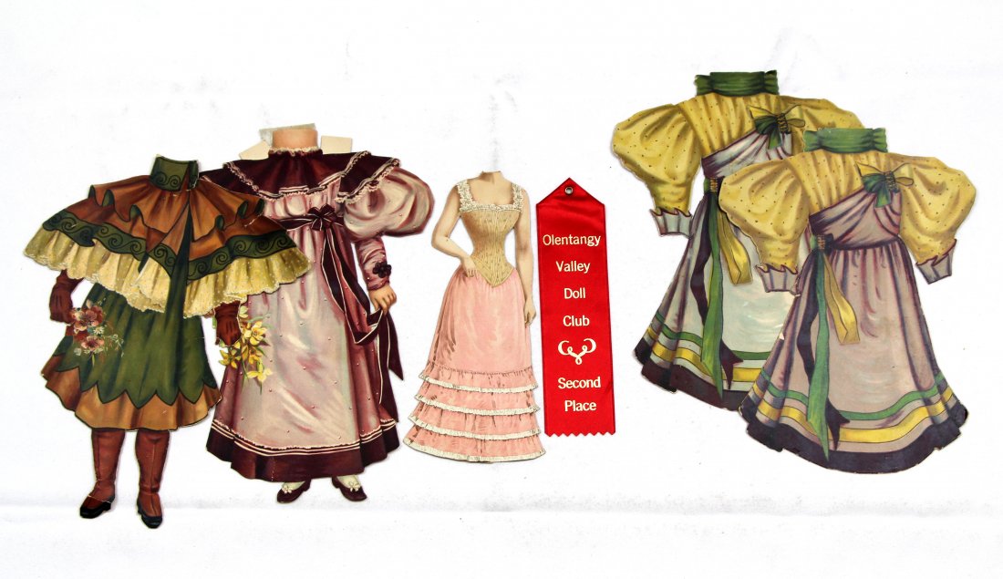 LARGE LOT OF CLOTHING AND ACCESSORIES: LARGE LOT OF CLOTHING AND ACCESSORIES. As shown, mostly magazine cut outs except for the ones photographed next to ribbon (four of those are costumes by Raphael Tuck for Sweet Alice). Lot includes one