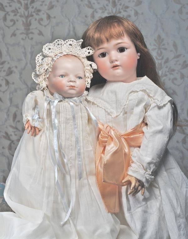 GERMAN BISQUE BYE-LO BABY. Marks: Copr. By Grac: GERMAN BISQUE BYE-LO BABY. Marks: Copr. By Grace S. Putnam. 17"; head circ. 14 ½". Solid-dome bisque head, flange-type neck, molded and painted hair, blue sleep eyes, eyeliner, tinted brows, closed m