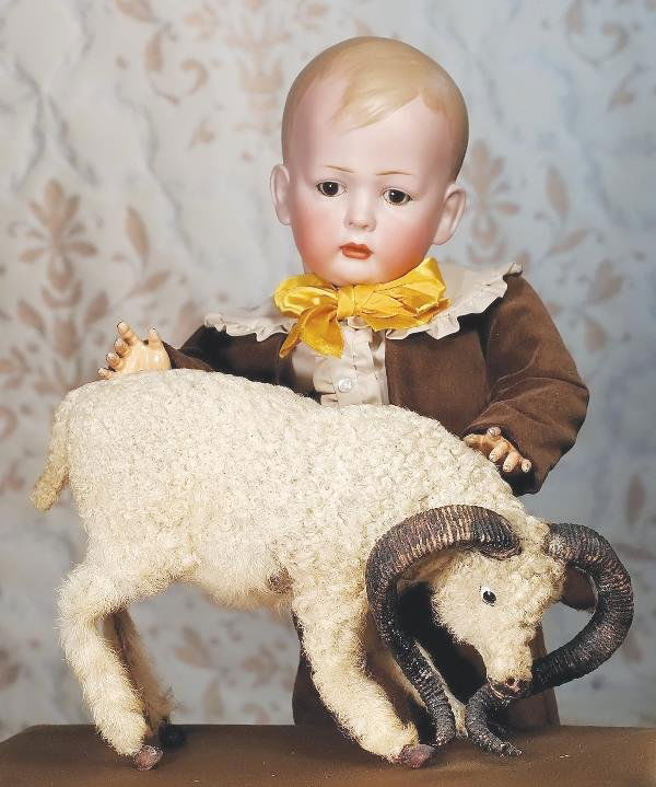 GERMAN BISQUE "TOMMY TUCKER" CHARACTER BOY BY BR: GERMAN BISQUE "TOMMY TUCKER" CHARACTER BOY BY BRUNO SCHMIDT. Unmarked. 22 ½". Solid-dome bisque socket head, molded and painted brown hair, side-parted with brush-marked detail framing face, stationa