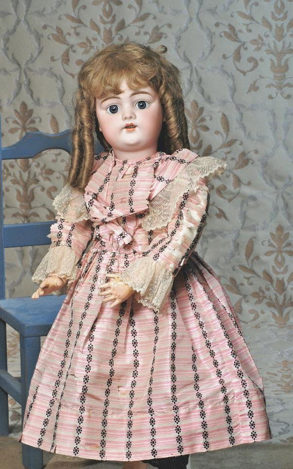 GERMAN BISQUE DOLL BY SIMON & HALBIG IN ORIGINAL: GERMAN BISQUE DOLL BY SIMON & HALBIG IN ORIGINAL DRESS. Marks: S H 1079 dep. 24". Bisque socket head, blue sleep eyes, painted lashes, feathered brows, pierced ears, open mouth, accented lips, square-