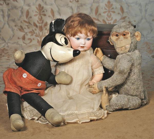 SHUCO'S "YES/NO" MONKEY. Straw-filled brown woo: SHUCO'S "YES/NO" MONKEY. Straw-filled brown wool mohair monkey with felt-mask face, stitched nose, applied felt mouth, large amber bead eyes with felt "eyelids", mohair beard, felt ears, jointed long