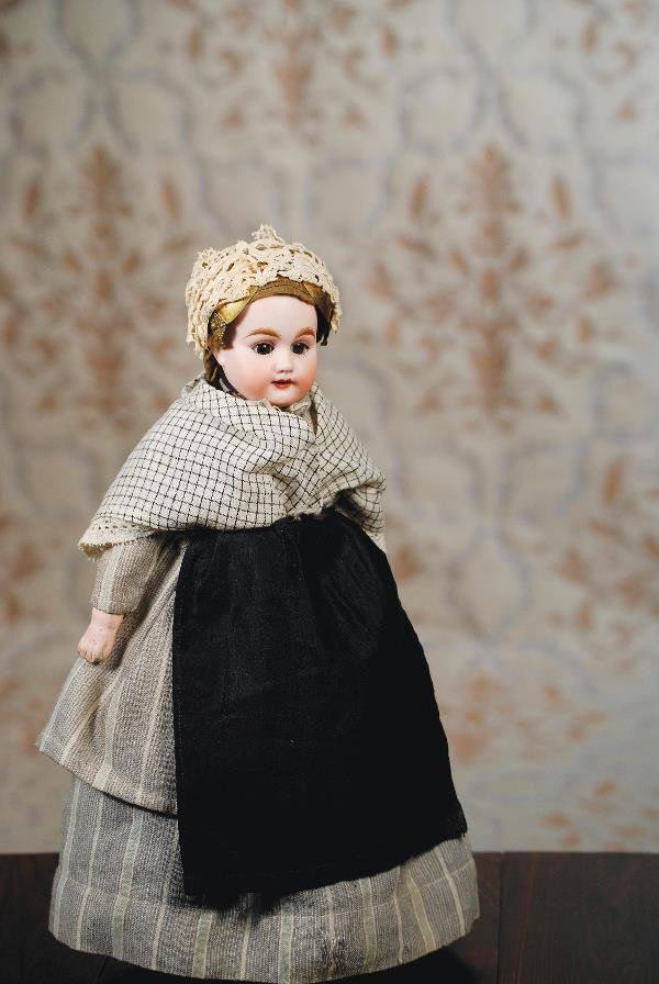 GERMAN BISQUE DOLL IN PROVINCIAL COSTUME - ATTRI: GERMAN BISQUE DOLL IN PROVINCIAL COSTUME - ATTRIBUTED TO BAHR & PROSCHILD. Marks: 309 - 3. 13". Bisque shoulderhead, brown sleep eyes, painted lashes, feathered brows, open mouth, accented lips, squar
