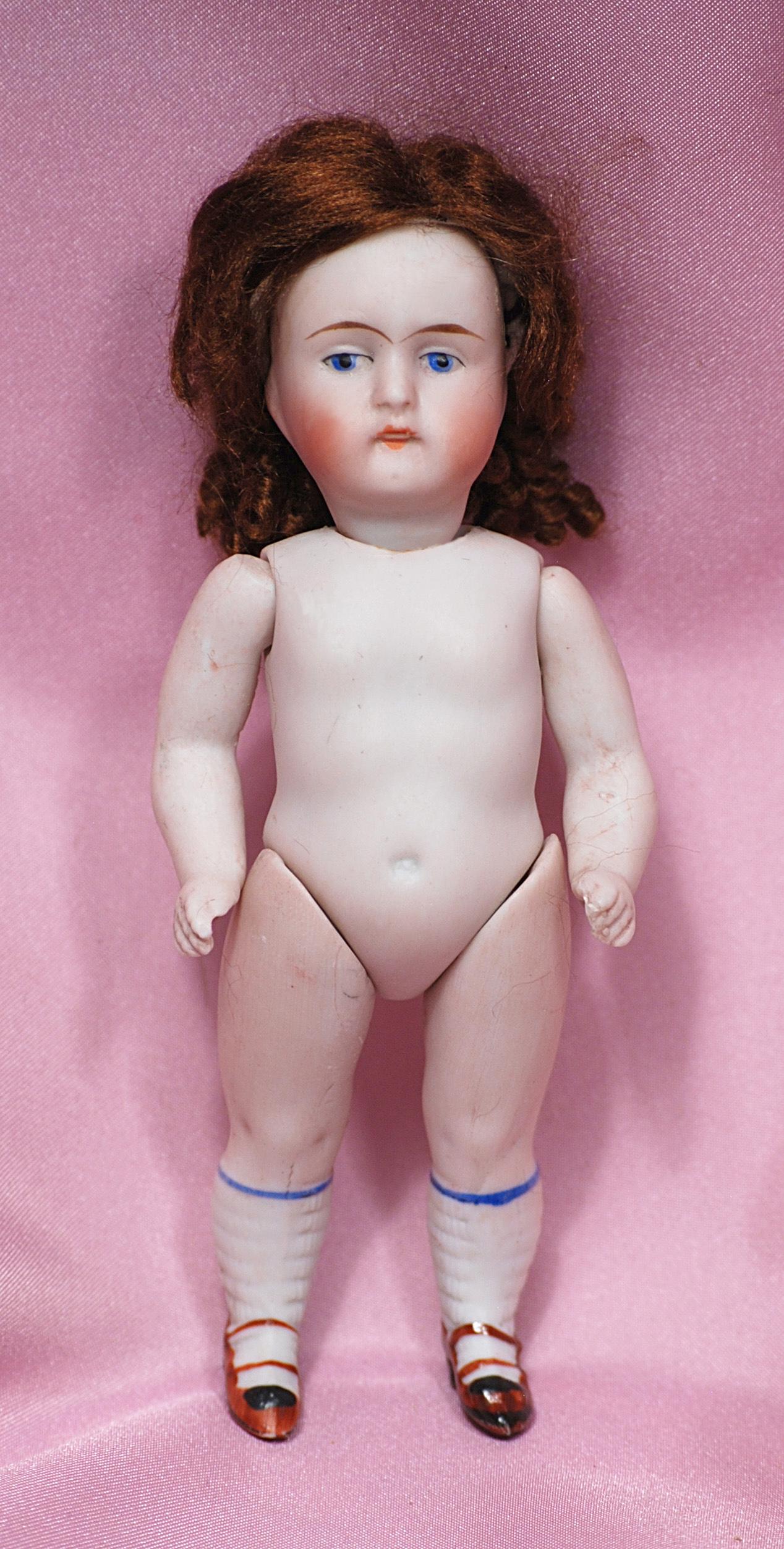 GERMAN ALL-BISQUE DOLL WITH SWIVEL NECK. (1 of 1)