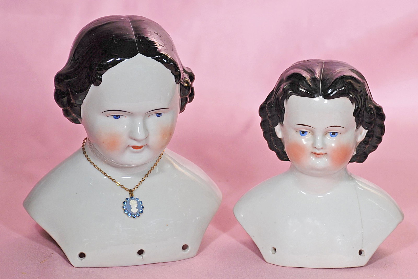 TWO GERMAN CHINA SHOULDER HEADS (1 of 1)