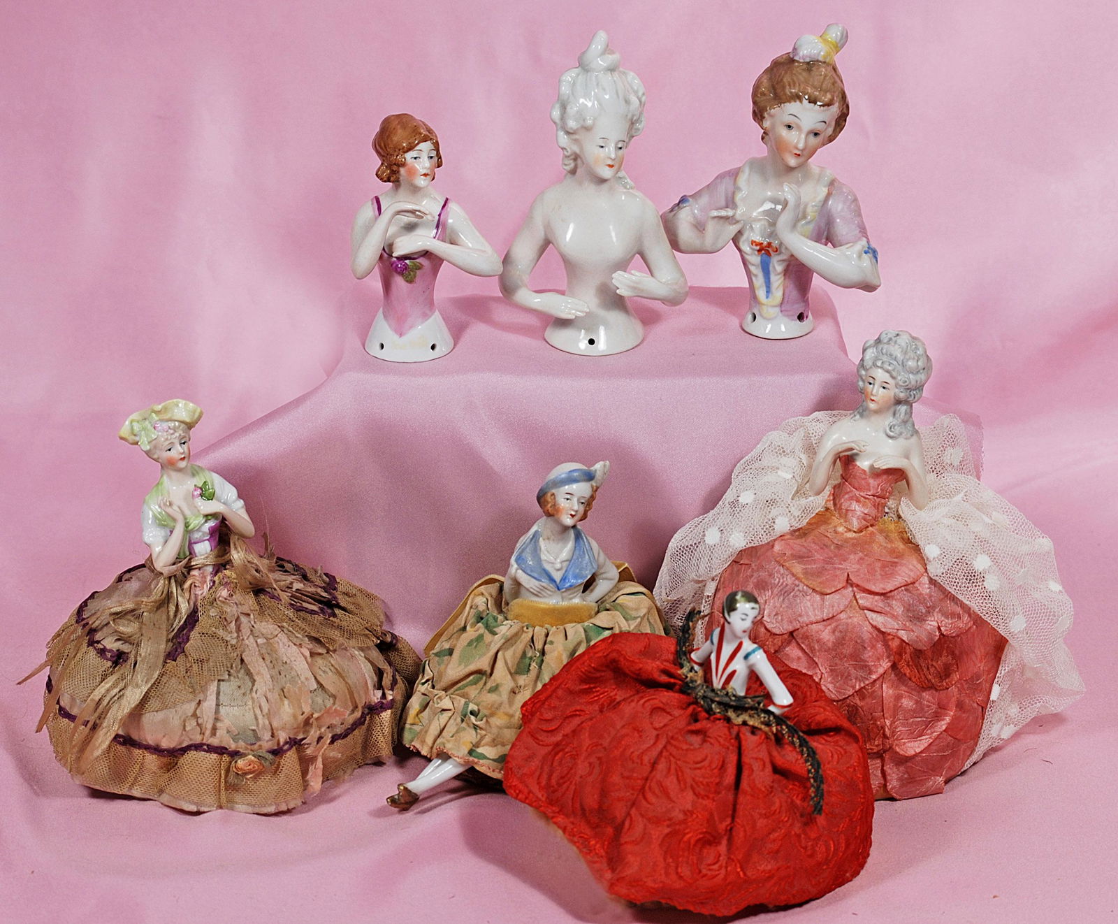 SEVEN GERMAN PORCELAIN HALF DOLLS (1 of 1)