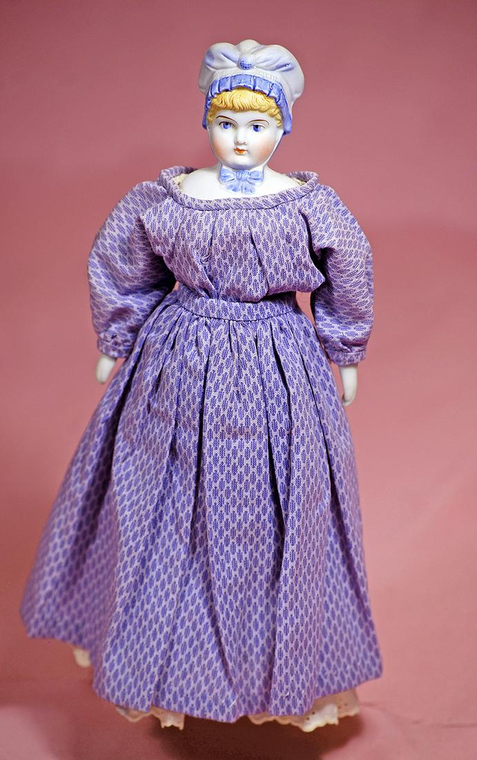 PETITE GERMAN BISQUE DOLL BONNET DOLL. (1 of 2)