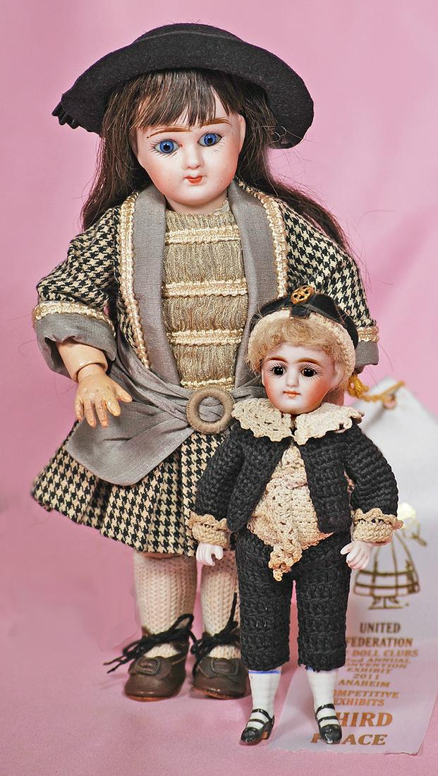 GERMAN SLENDER ALL-BISQUE DOLL. (1 of 2)