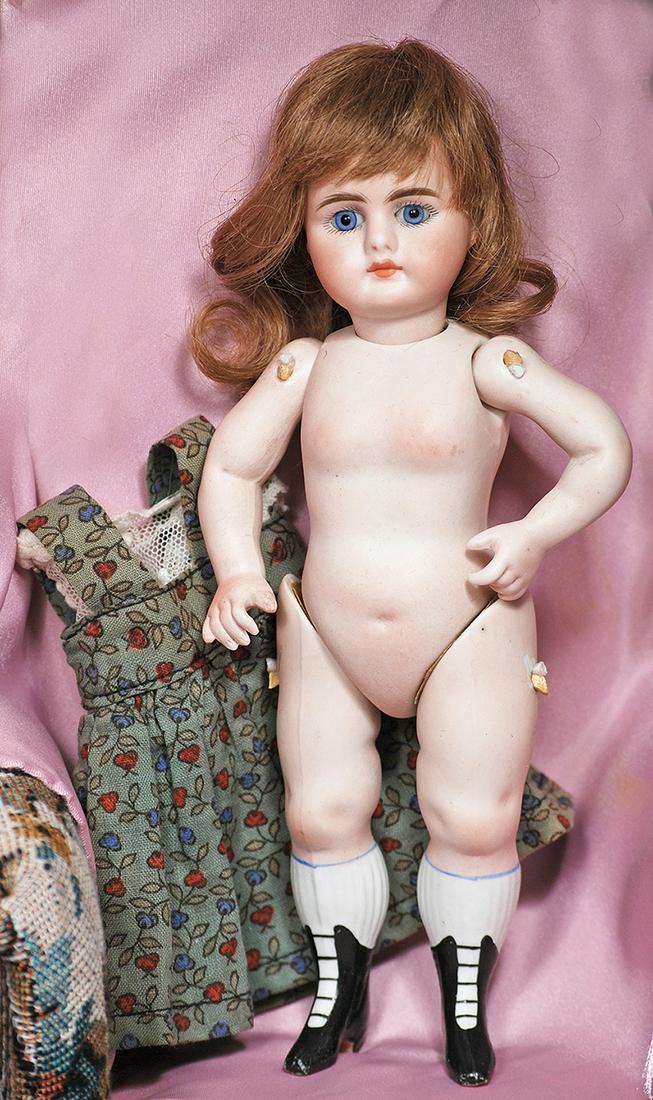 ALL-BISQUE DOLL WITH FIVE-STRAP BOOTINES ATTRIBUTED TO (1 of 1)