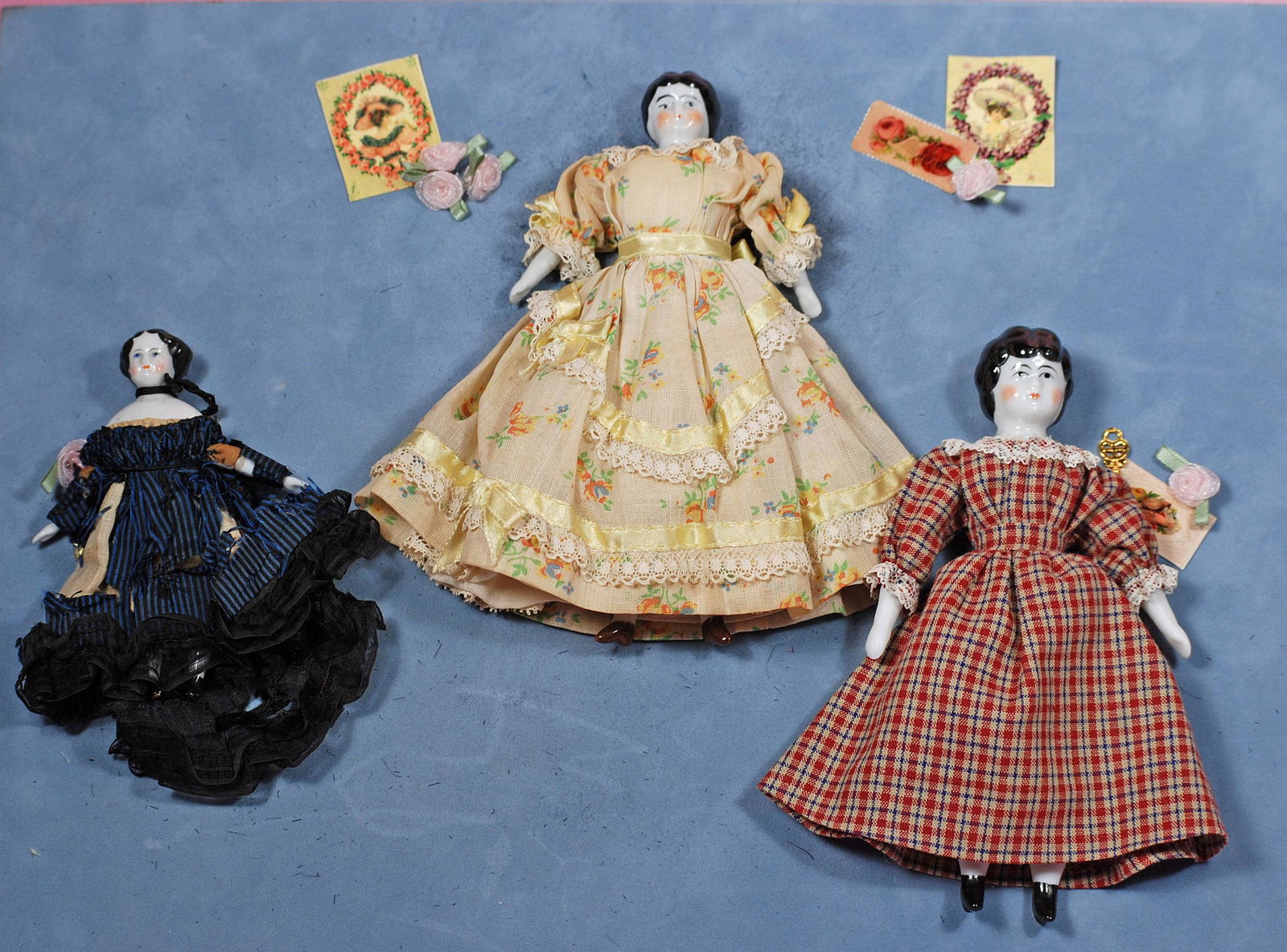 THREE MINIATURE CHINA DOLLS. 4”, 6” and 6 ½”. Each is (1 of 1)