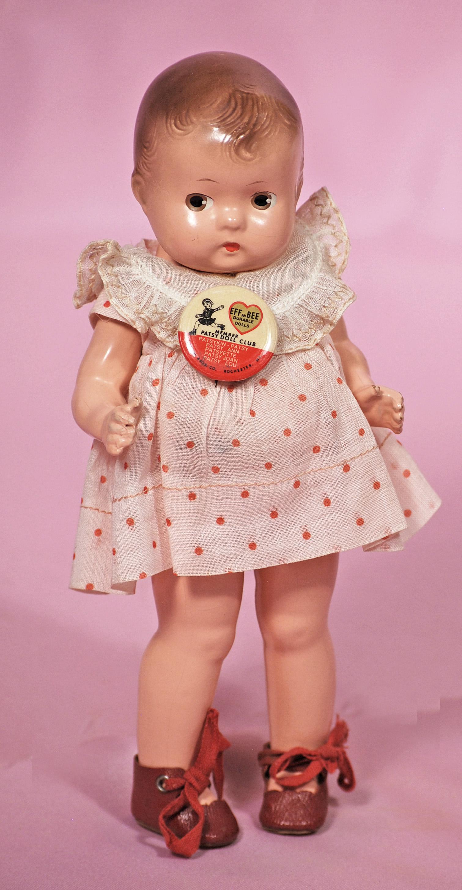 COMPOSITION Â“BABY TINYETTE” BY EFFANBEE. 8Â”. Marks:: COMPOSITION "BABY TINYETTEÂ” BY EFFANBEE. 8”. Marks: Effanbee Baby Tinyette. Composition socket head on five-piece jointed body, painted brown hair, painted features, original polka dot dress wit