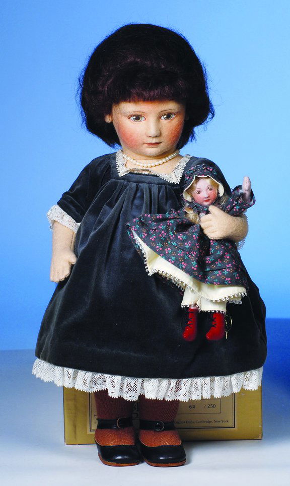 R. JOHN WRIGHT "RACHEL, SUNDAY BEST". 17". All-f: R. JOHN WRIGHT "RACHEL, SUNDAY BEST". 17". All-felt, fully-jointed, mohair wig, painted features, velvet dress, leather shoes, holds miniature all-felt doll. Commentary: Circa 1985-1986, Little Series