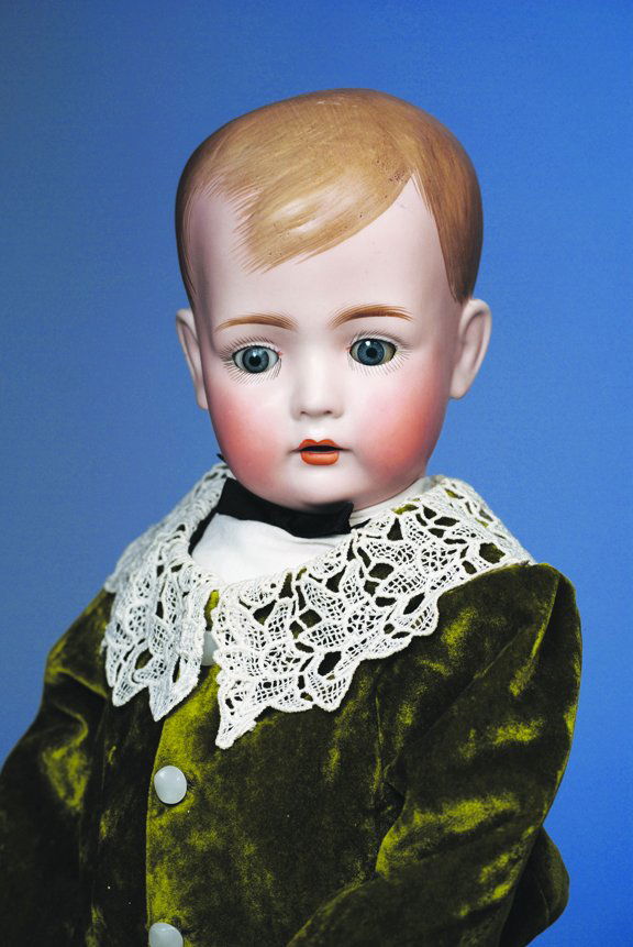 TOMMY TUCKER GERMAN BISQUE DOLL BY BRUNO SCHMIDT.: TOMMY TUCKER GERMAN BISQUE DOLL BY BRUNO SCHMIDT. Marks: BSW in heart/ 2048/ 14 ½. 21". Bisque socket head, molded and painted brown side-parted hair, blue sleep eyes, painted lashes, feathered brows